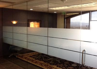 Three privacy window film bands installed on conference room glass