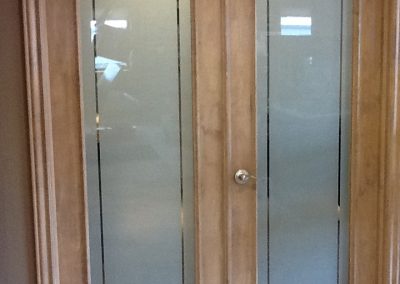 White frost film on double doors with clear stripes around edges