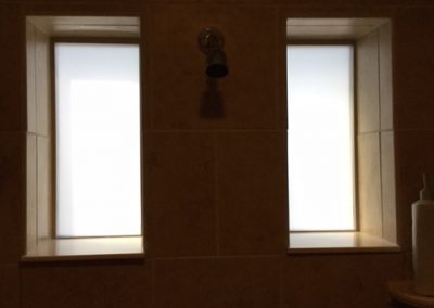 White frost window film installed for privacy on shower windows