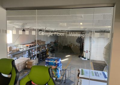 Distraction window film band squares with company logo pattern on office glass