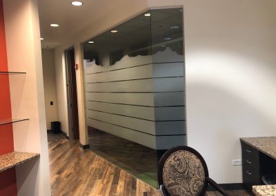 Frost window film band with a mountain outline top on conference room glass