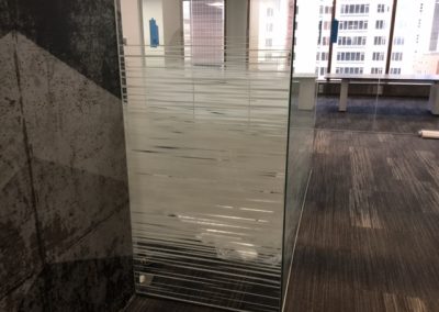 Solyx Dual Motion Gradient decorative window film installed on corner office glass