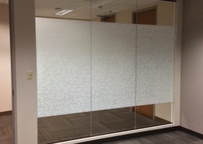 Solyx Gotham designer window film band installed on office conference room