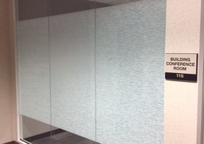 Solyx Gotham designer window film band installed on office conference room